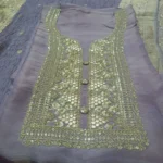 embroided neck with shimmer fabric