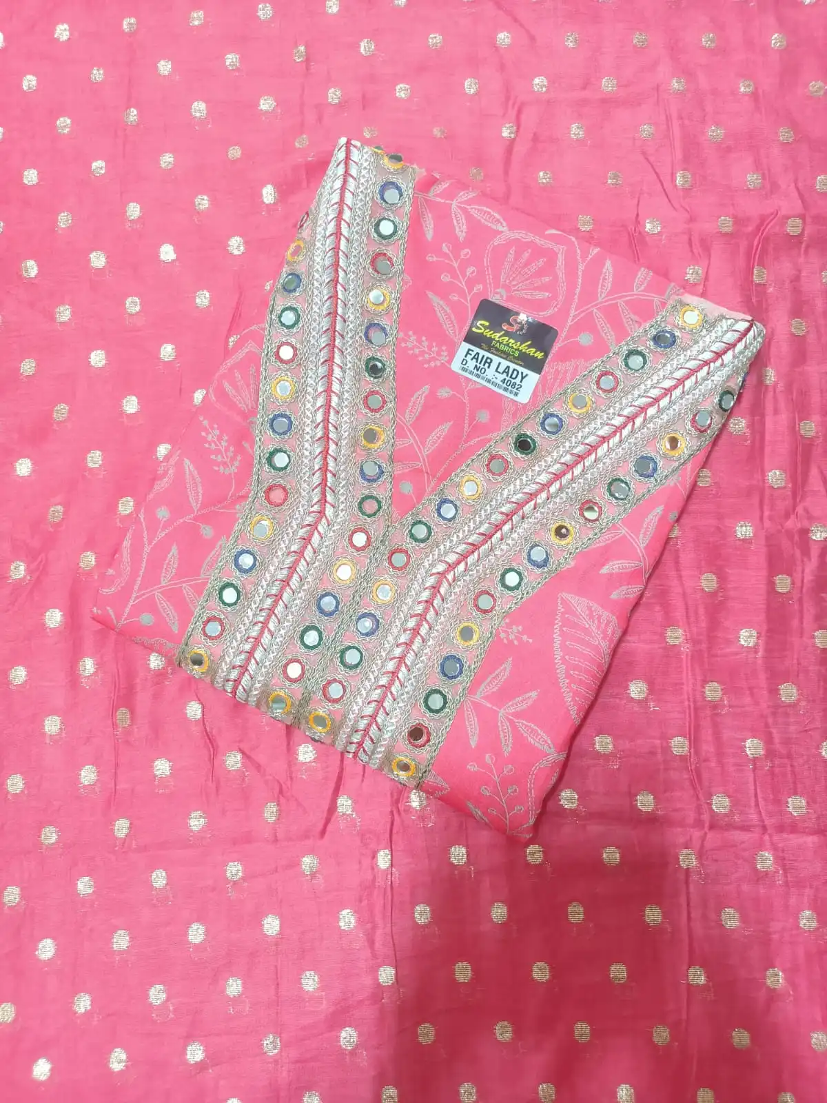 WhatsApp Image 2026-07-25 at 12.46.24 PM Pink cotton unstitched suit set with multicolor mirror work embroidered neckline